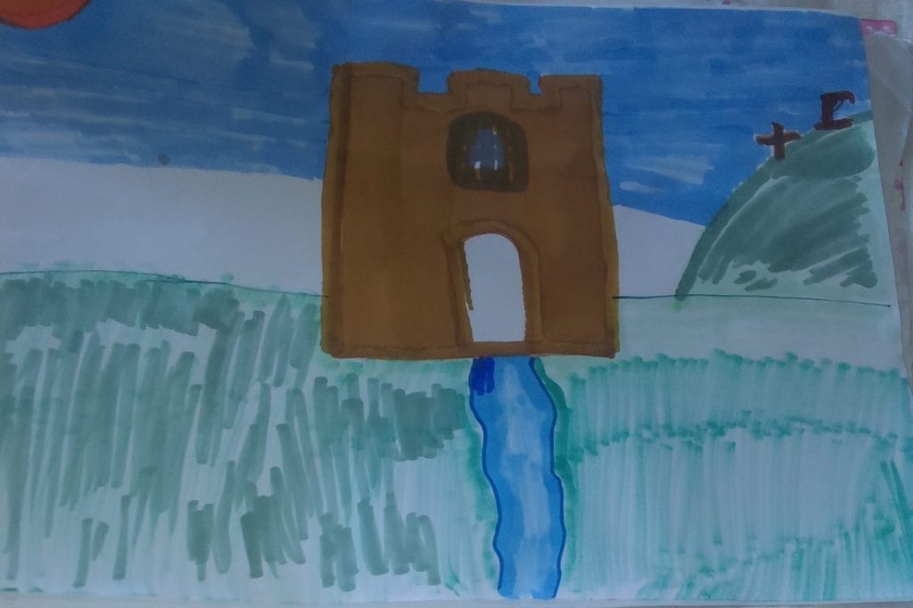 A child's drawing of a brown castle on a green hill with a blue river flowing in front, under a blue sky with a sun.